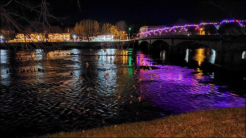 Alderson Memorial Bridge and lights in the river 