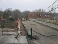 The sides and sidwalks were torn down and replaced. Notice condition of bridge on the oppisite side.