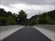 The bridge is always open to pedestrain traffic and gives a great view up and down the river. Great spot for fishing.