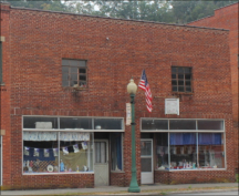 Jim Russell's Radio & TV Shop on the left / Dixon Printers on the right.